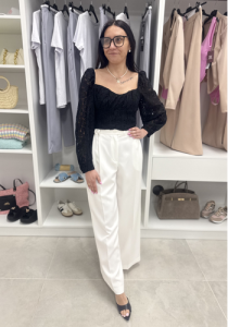 Eleganckie białe spodnie damskie z szeroką nogawką MeGusta 