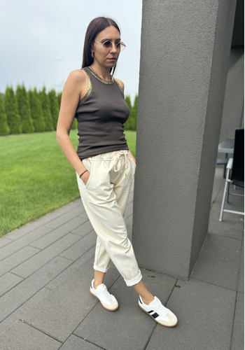 Złote błyszczące spodnie na gumce 1